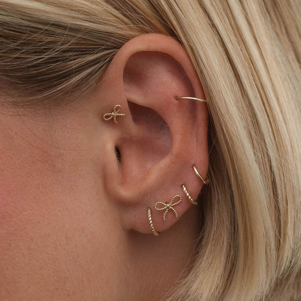 Puth rope clicker piercing
